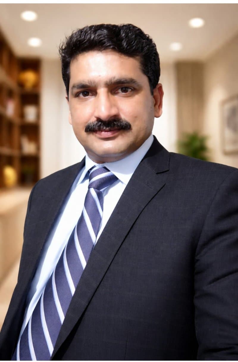Portrait of Khalid Malik, Director of HR, Administration and Operations